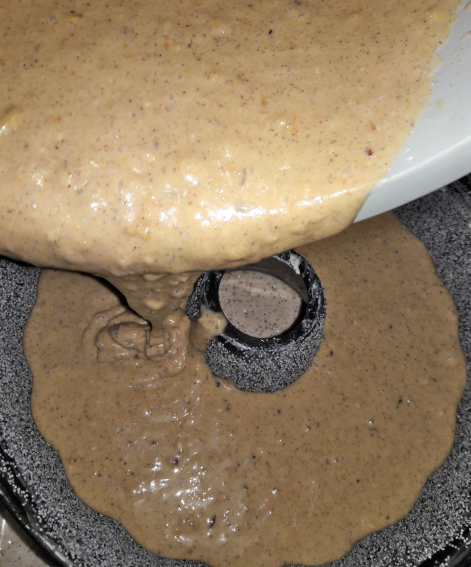Pouring the cake batter into pan